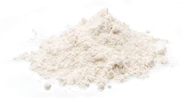 istock Heap of refined wheat or rye flour isolated on white background. 2210686568