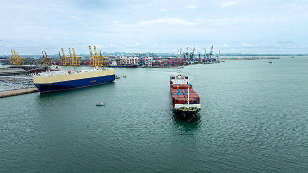 istock container ship carrying goods for international import export, business and industry regarding cargo transportation services to consumers and dealers by container ship around the world, 2210688736