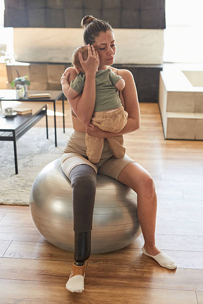 Loving Mother with Disability Cuddling Child