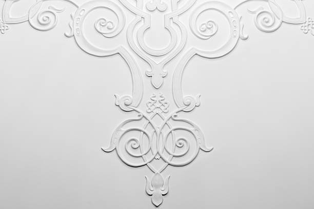 istock Symmetric white plaster relief showcasing elegant floral design 2210692222