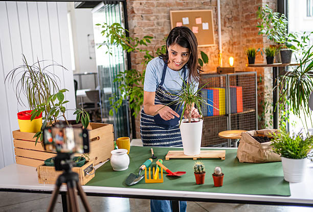 istock Influencer creating online gardening content for social media 2210692715