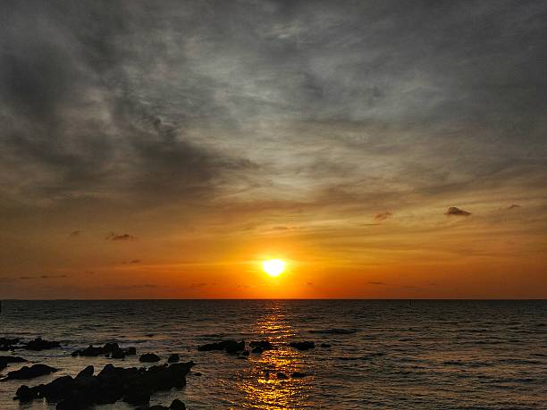 istock Sunset in the middle of the sea. 2210692971