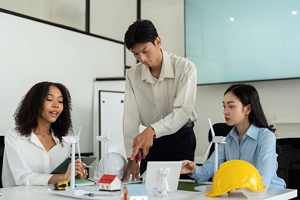 istock ESG Strategies and Team Dynamics. Professionals engaged in an eco-friendly project discussion. 2210694243