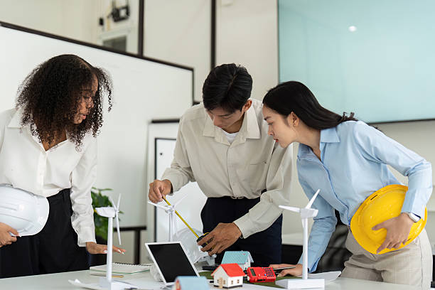 istock Sustainable Design and Team Collaboration. Professionals working on eco-friendly engineering strategies. 2210694305