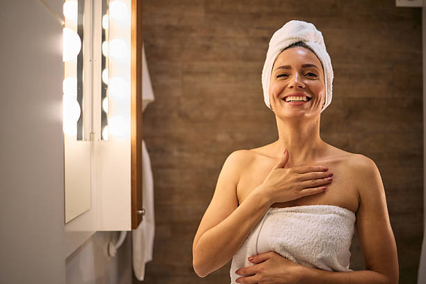 istock Smiling Woman Enjoying Spa Routine at Home 2210696627
