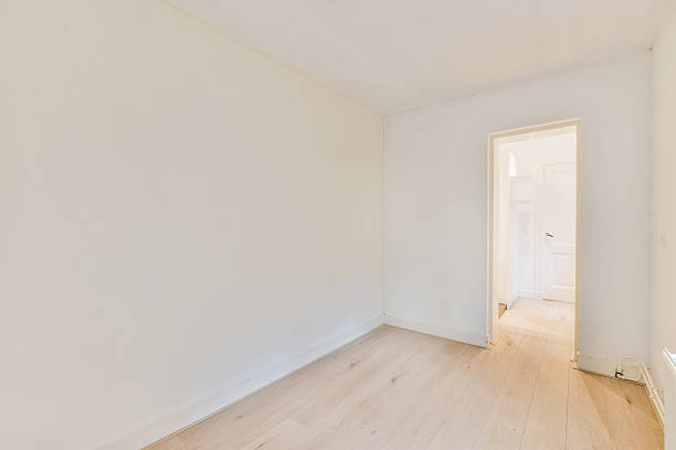 istock Interior of a spacious room with beautifully laid parquet 2210698377