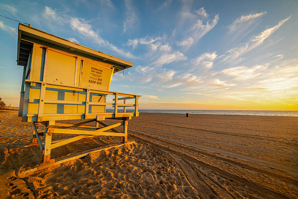 istock Lifeguard tower in Malibu shore at sunset 2210710591