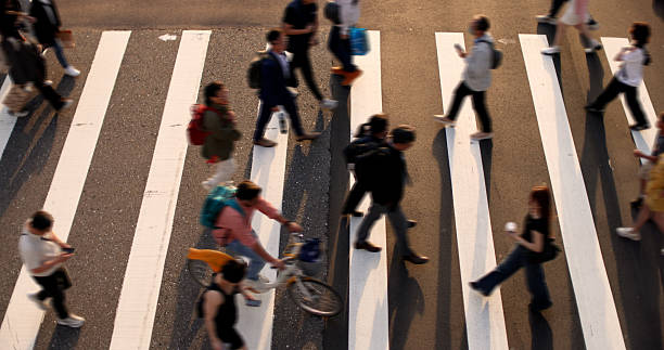istock People walking on zebra crossing 2210711691