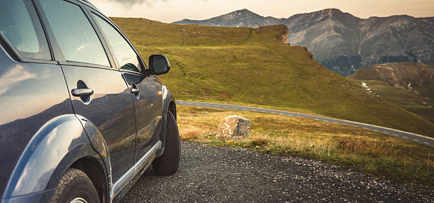 istock car for traveling with a mountain road 2210712740