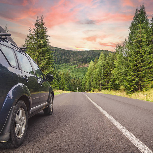 istock car for traveling with a mountain road 2210712800