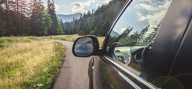 istock car for traveling with a mountain road 2210713506
