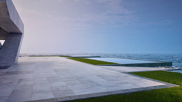 istock Empty concrete floor terrace near water. 2210714725