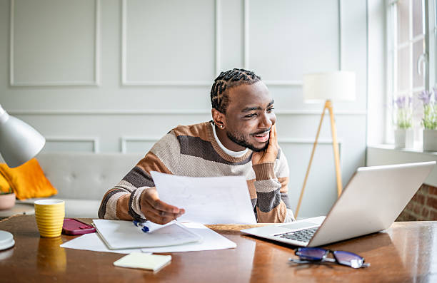 istock Young man engaged in online learning at home, demonstrating the modern approach to education and remote study sessions 2210716540