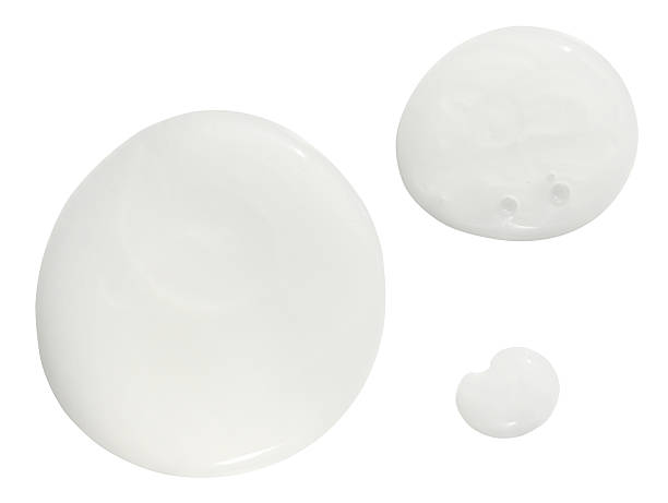 istock White round drops gel shampoo isolated on a white background. 2210716646