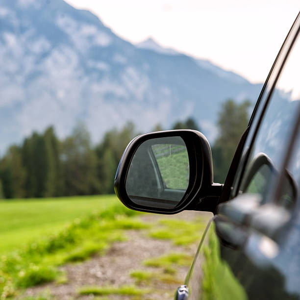 istock car for traveling with a mountain road 2210717478