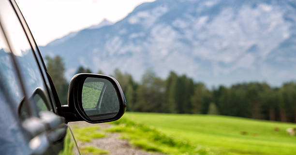 istock car for traveling with a mountain road 2210717511