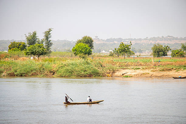 Dakar, Senegal - 03 Jan 2022: The fisherman on Lake Retba, Lac rose close Dakar, Senegal, West Africa