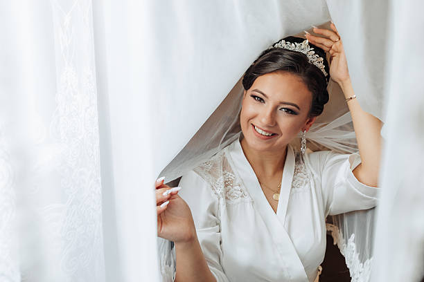 istock A woman is smiling and wearing a veil 2210726654