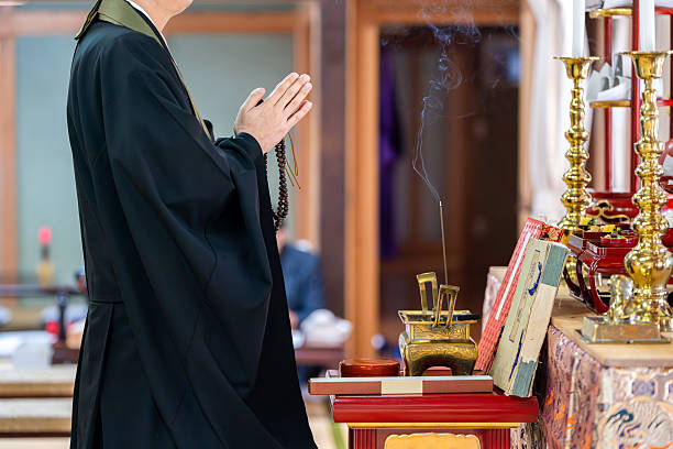 istock Image material of a monk praying at a Buddhist altar 2210728856