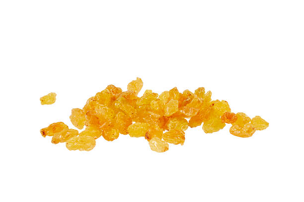 istock yellow raisins isolated on white 2210730847