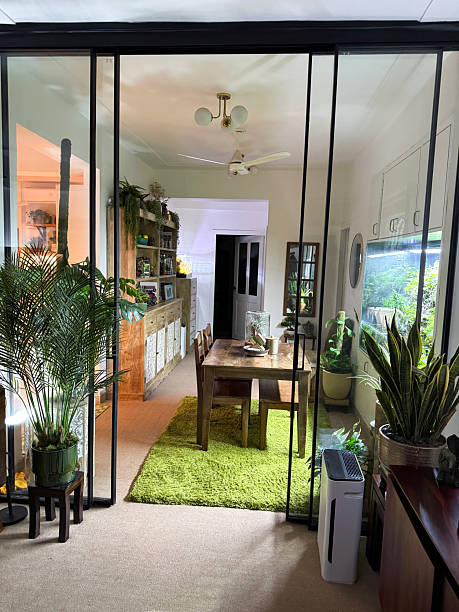 istock Image of modern interior design, metal double doors, glazed glass sliding partition, dividing room / sleek, functional divider, contemporary living 2210733627