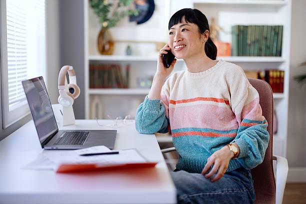 istock Woman talking with her clients on a smartphone 2210737416