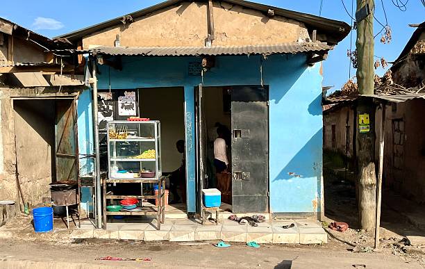 Tanzania - Arusha - Poor neighborhoodThis is one of the shops in an old shack,  located in one of the poor neighborhoods south of Arusha.December 31, 2024
