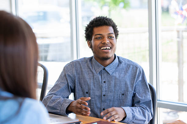istock Young man attends job interview in modern office 2210741551