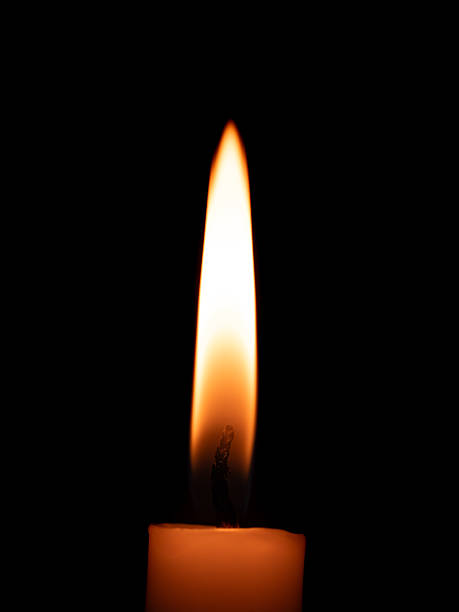 istock Candle burning in the dark. Candlelight in the night 2210743641