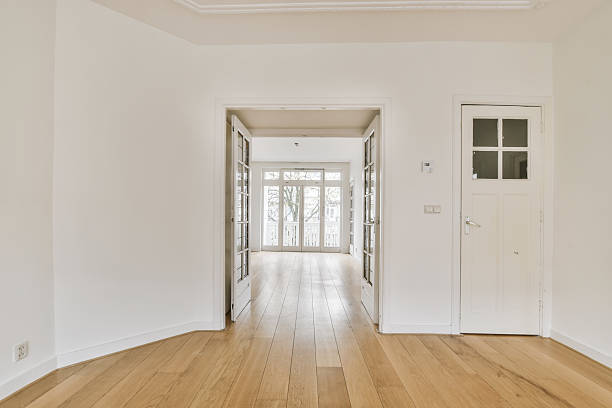 istock Room with door and parquet floor 2210743964