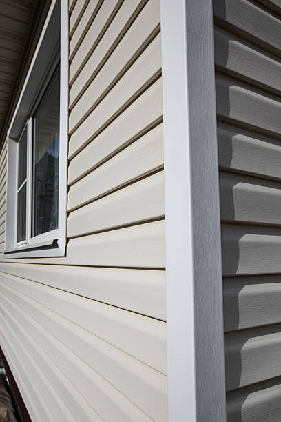 istock The corner of a house made with siding planks 2210743980