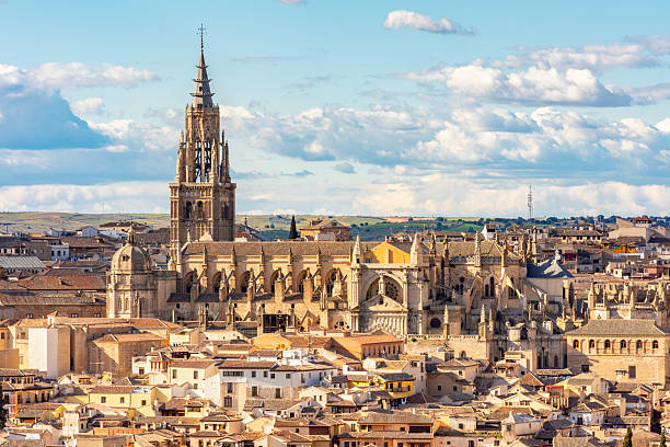 istock Toledo Cathedral above old town roofs, Spain 2210744093