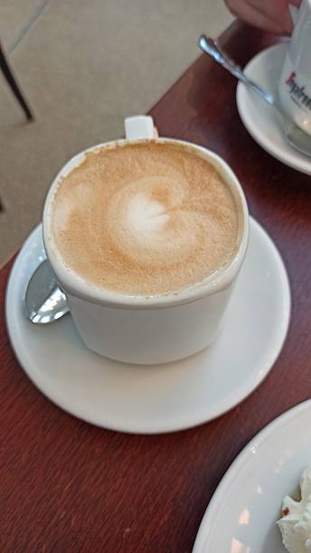 istock A cup of cappuccino with foam art 2210745154