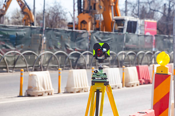 istock An optical road level stands on a road undergoing repairs. 2210753813