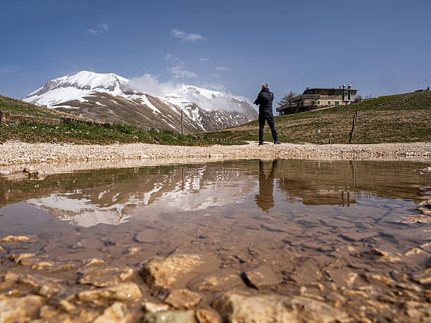 istock Environmentalist Photographer on Mount Vettore 2210755018