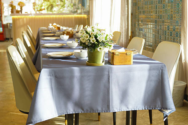 A sophisticated dining table with chic decor and vibrant apples, ideal for gatherings and celebrations