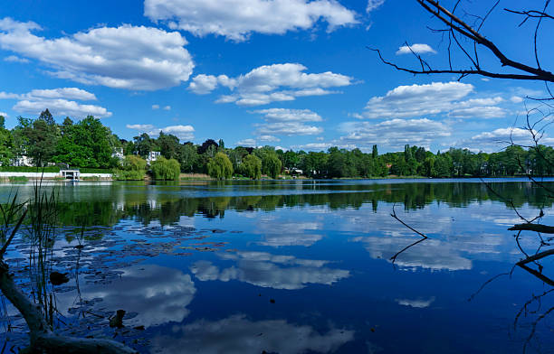istock Cloud Reflections on Hundekehlesee Lake in Berlin-Grunewald 2210760256