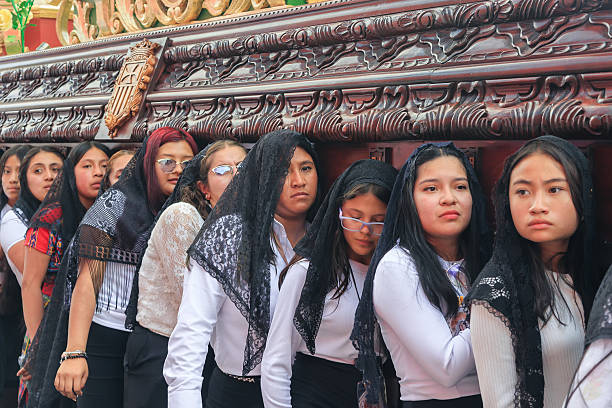 Quito, Pichincha, Ecuador - April 15, 2022: Cucurucho's close-up participating in the vibrant Jesus del Gran Poder procession during Holy Week in Quito, Ecuador, showcasing faith and culture