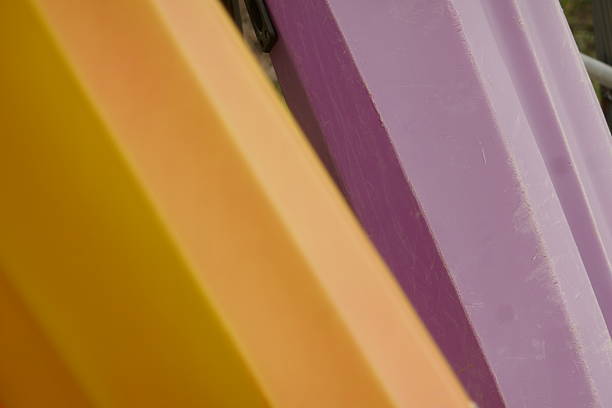 istock Colourful kayaks on the wall 2210764578