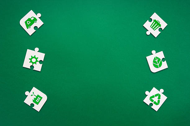 istock Environmental Puzzle Pieces on Green background 2210767824