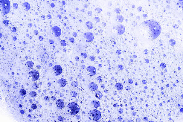 istock Violet blonde dye hair shampoo foam texture 2210768935