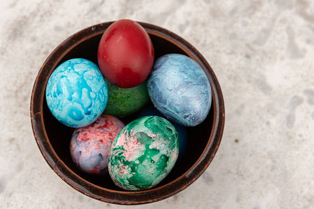 Easter eggs with flowers in nature