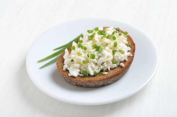 istock Bread with curd cheese and green onion 2210771499