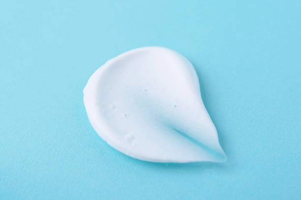 istock Sample of fluffy foam on light blue background, top view 2210776930