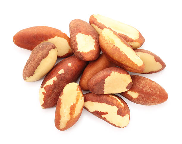 istock Heap of Brazil nuts isolated on white, top view 2210778708
