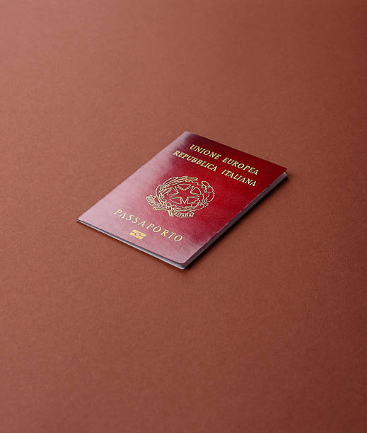 istock Italy passport for travelling, flying and doing business. Italian document 2210779514