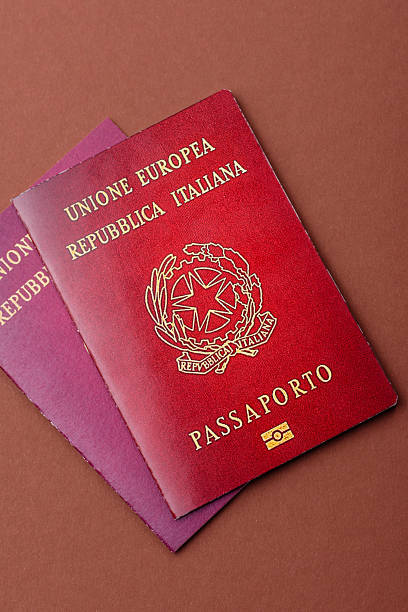 istock Italy passport for travelling, flying and doing business. Italian document 2210779558