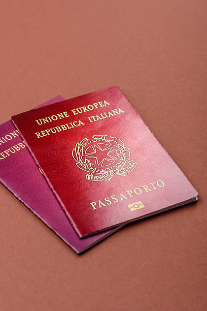 istock Italy passport for travelling, flying and doing business. Italian document 2210779563