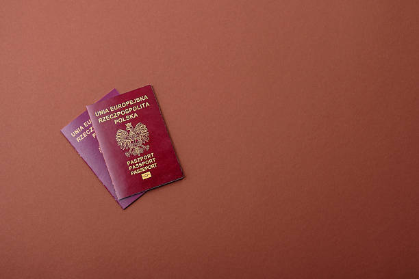 istock Poland passport for travelling, flying and doing business 2210780431