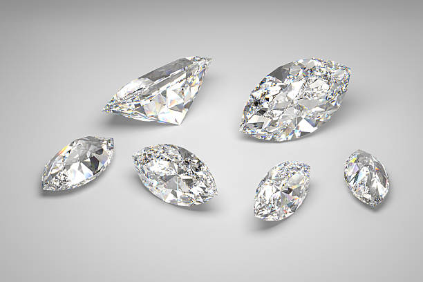 istock Scattering of diamonds of different sizes on the white background. Marquise cut. 3d rendering. 2210783028